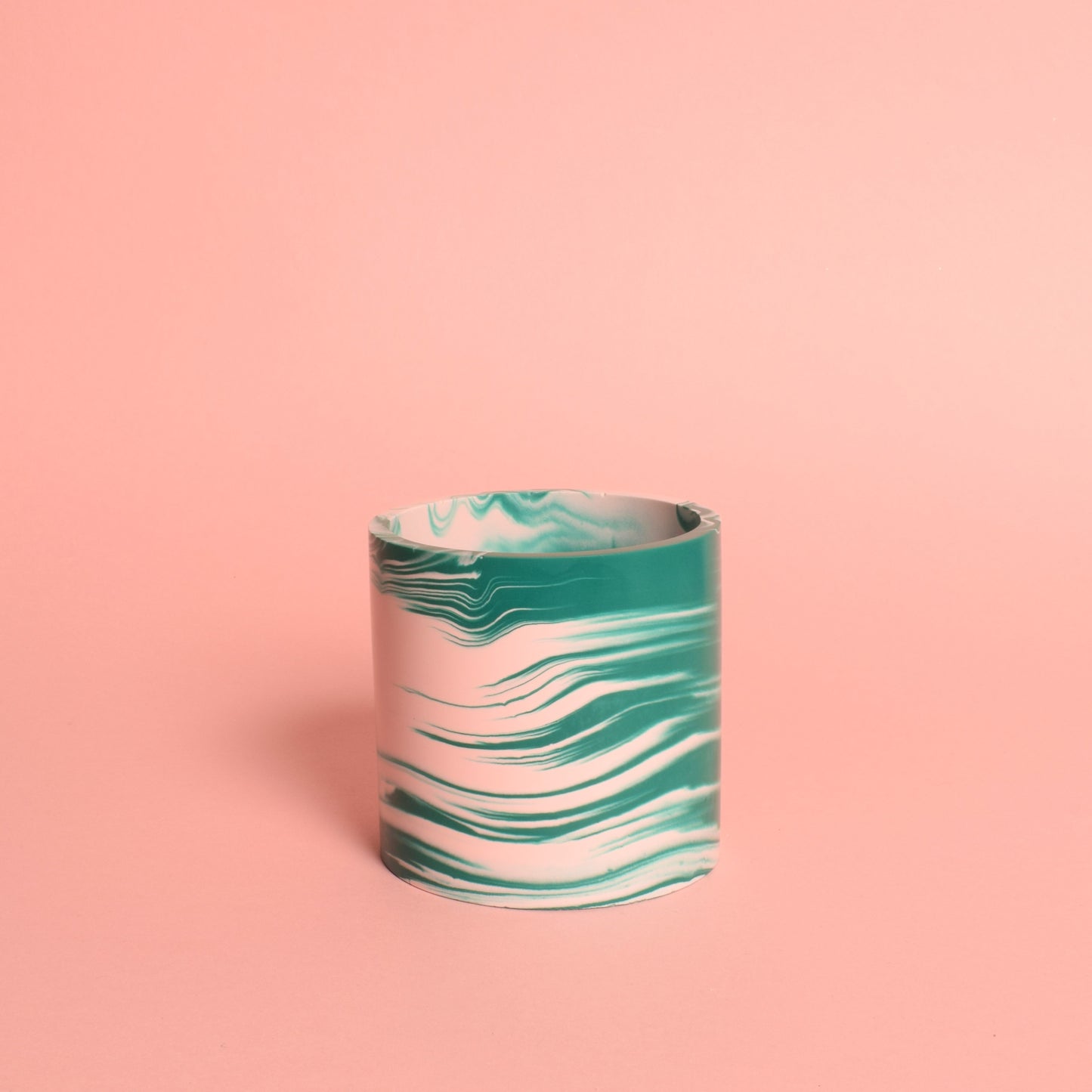 A marble effects pink and green multi-use pot.