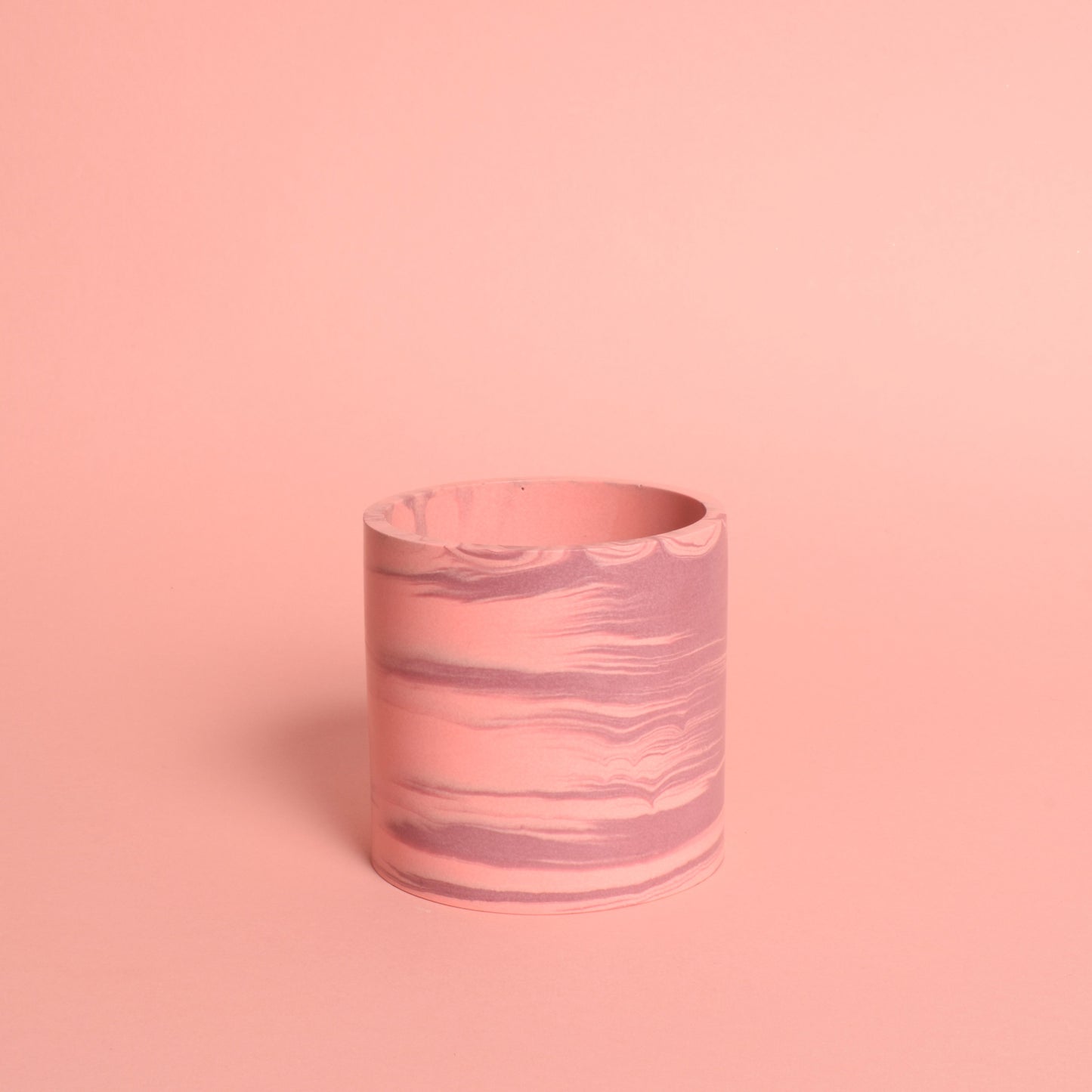 A marble effect pink and purple multiuse pot.